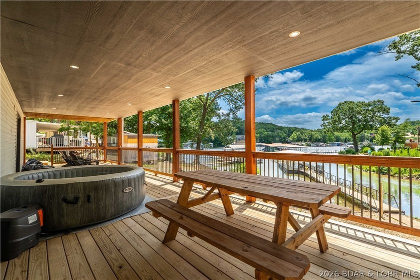 Lakefront living on 2 private acres at the 8MM near Laurie! - photo 35