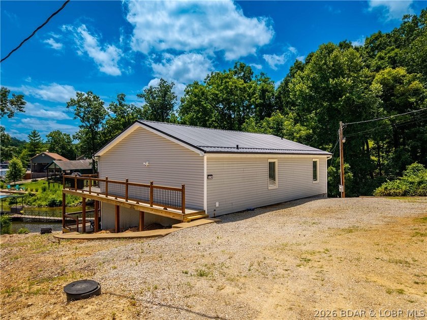Lakefront living on 2 private acres at the 8MM near Laurie! - photo 42