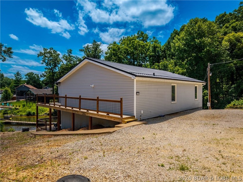Lakefront living on 2 private acres at the 8MM near Laurie! - photo 45