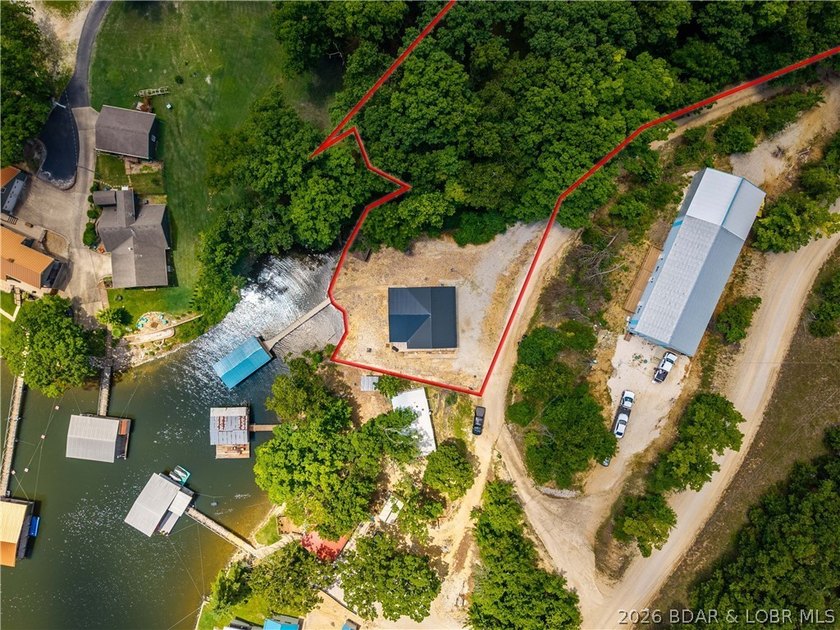 Lakefront living on 2 private acres at the 8MM near Laurie! - photo 46