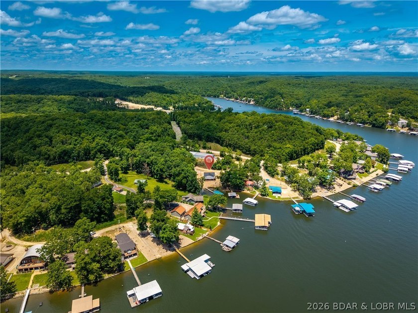 Lakefront living on 2 private acres at the 8MM near Laurie! - photo 47
