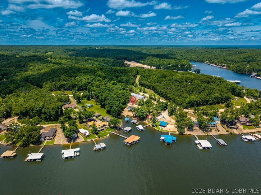 Lakefront living on 2 private acres at the 8MM near Laurie! - photo 48