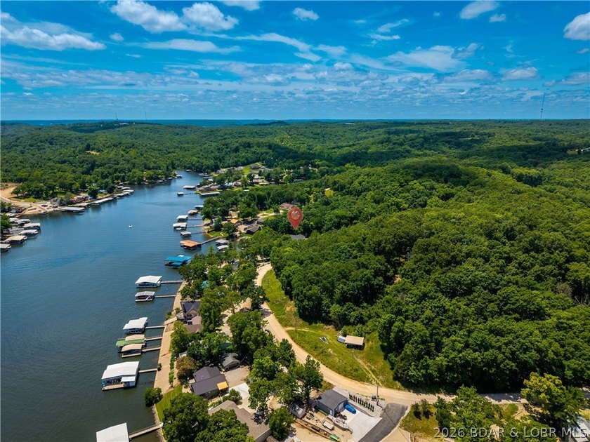 Lakefront living on 2 private acres at the 8MM near Laurie! - photo 50