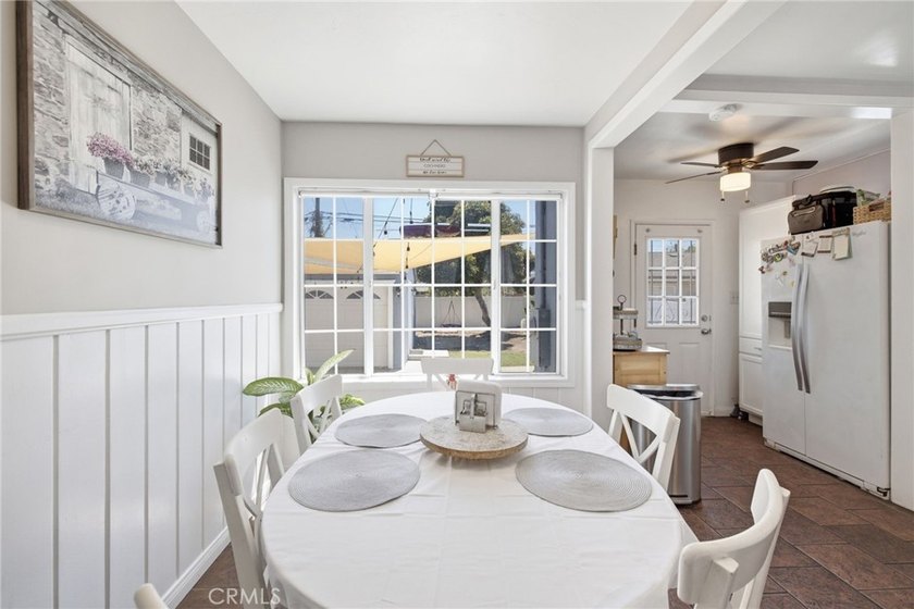 Nestled on a quiet tree lined street in North Long Beach, this - photo 14