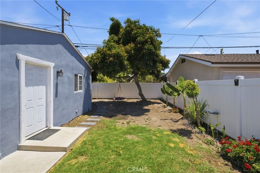 Nestled on a quiet tree lined street in North Long Beach, this - photo 33