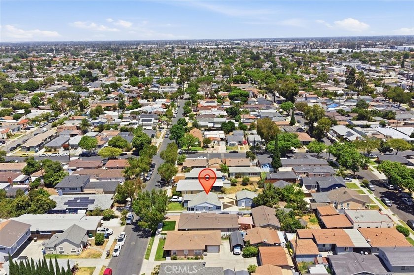 Nestled on a quiet tree lined street in North Long Beach, this - photo 35