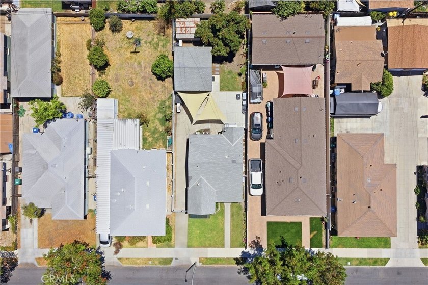 Nestled on a quiet tree lined street in North Long Beach, this - photo 40