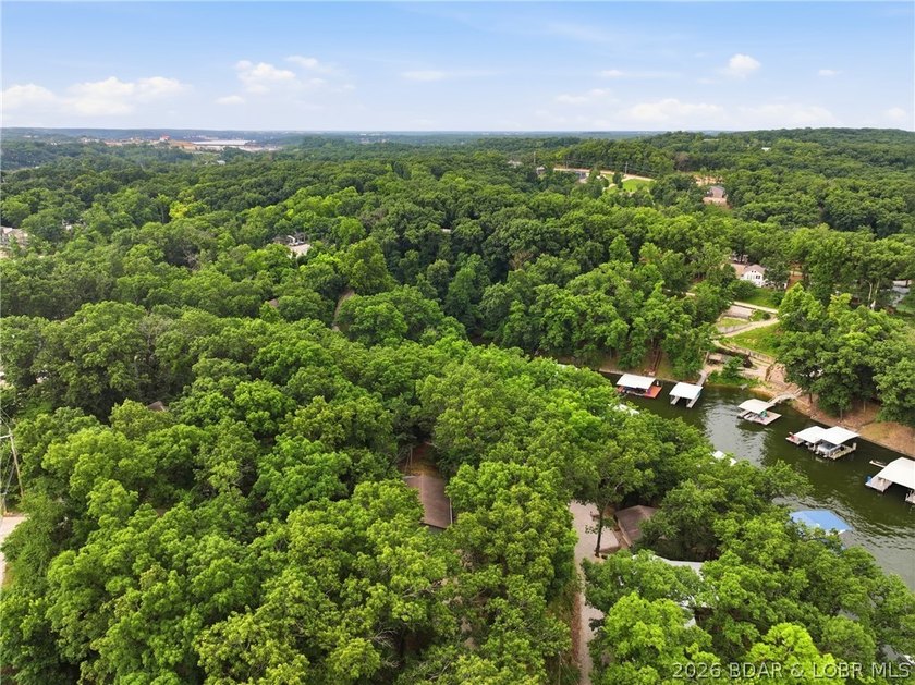 Experience the charm of lakeside living in this beautifully - photo 12