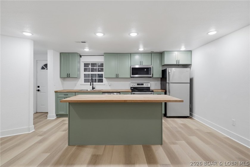 Experience the charm of lakeside living in this beautifully - photo 15