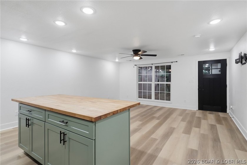 Experience the charm of lakeside living in this beautifully - photo 18