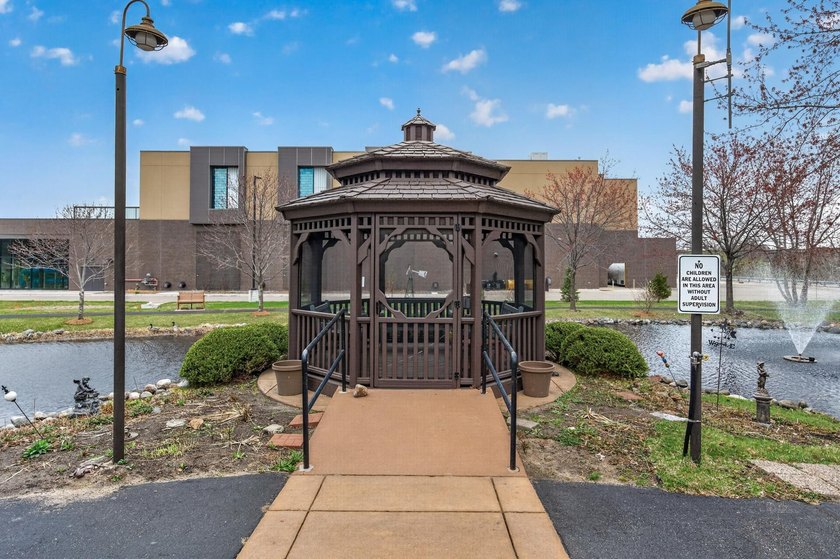Amazing second floor unit with a private balcony overlooking a - photo 23