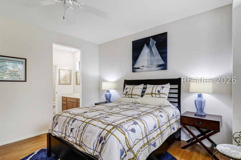 Tucked beneath a canopy of mature trees on the desirable - photo 23