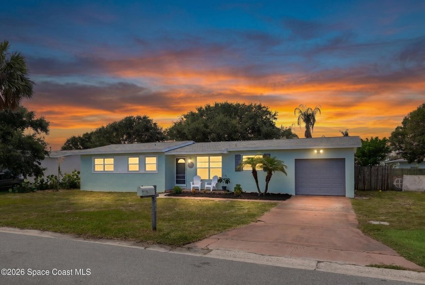 Embrace the ultimate beachside lifestyle in this beautifully - photo 3