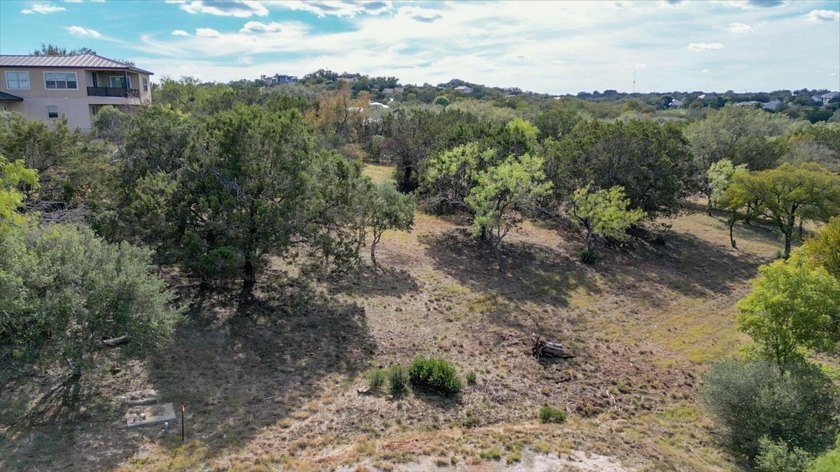 Gorgeous large lot that is fairly level with lots of trees! It - photo 12