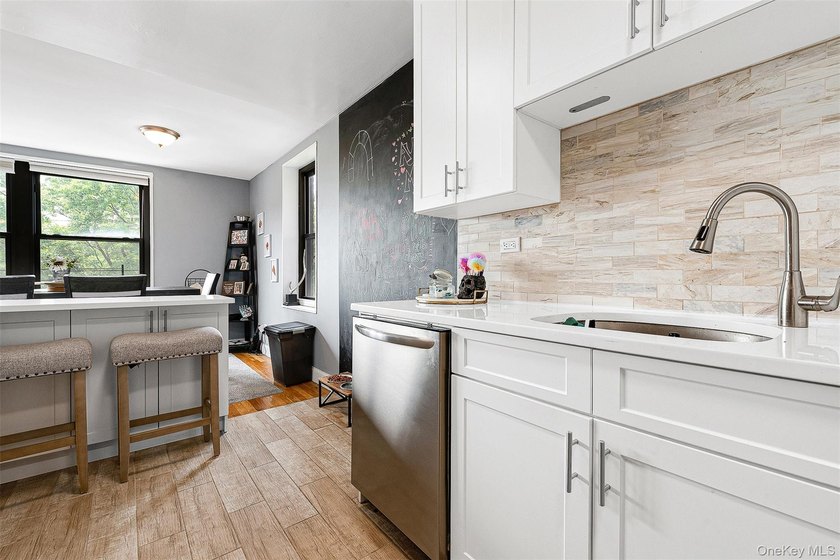 Welcome to this sprawling 3-bedroom, 2-bathroom corner unit in - photo 15