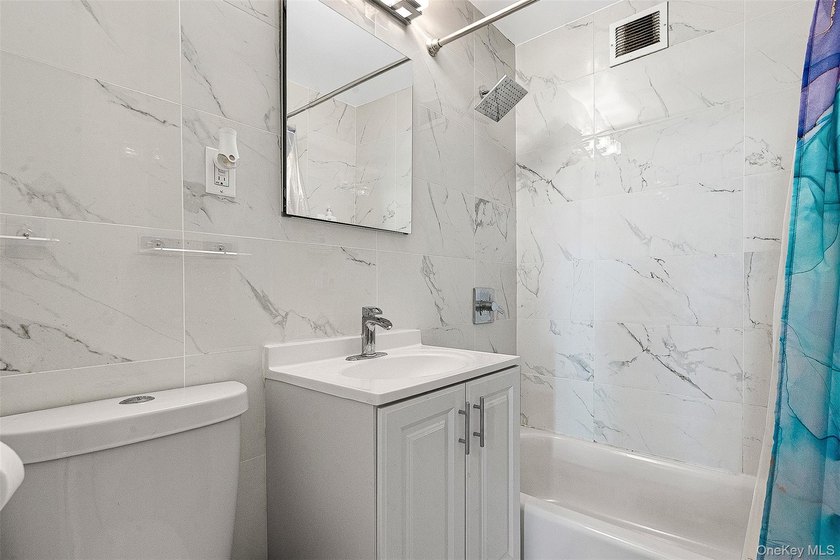 Welcome to this sprawling 3-bedroom, 2-bathroom corner unit in - photo 18