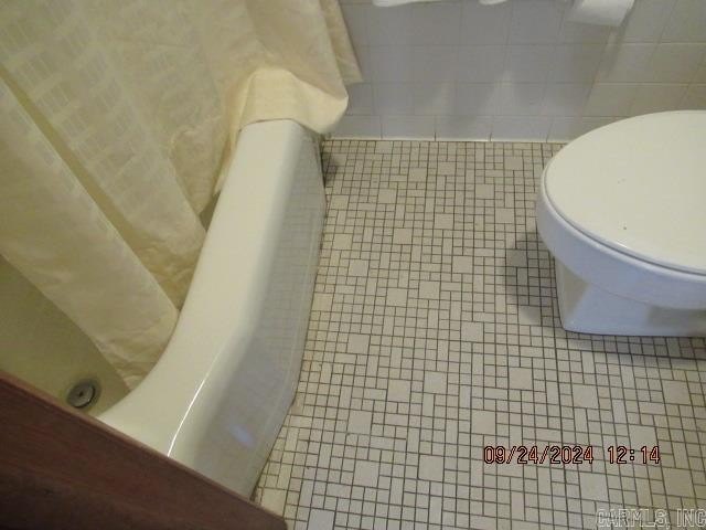 This is currently operating as a motel, but more so as a - photo 25