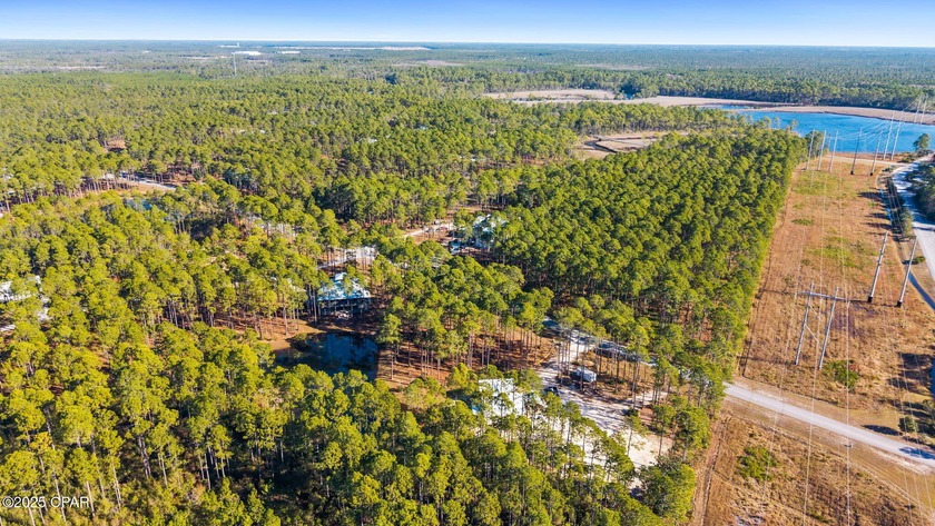 WATERFRONT LOT IN RIVERCAMPS: Make your new home in - photo 8
