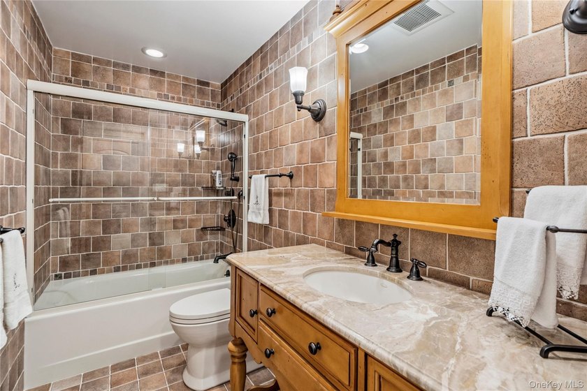 Welcome to Estates II Manhasset, an exquisitely updated Belaire - photo 11