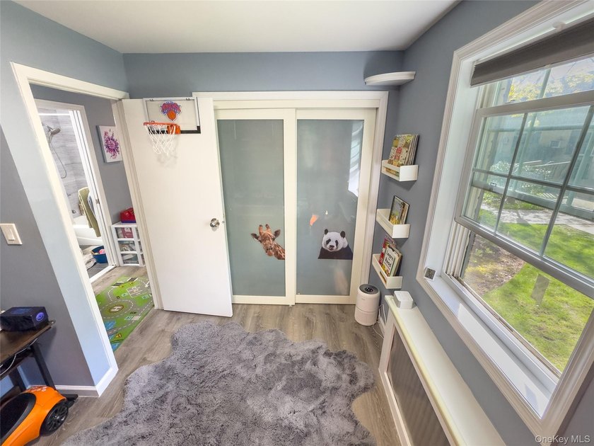 Tucked within the quiet, tree-lined Estates at Bayside, this - photo 18