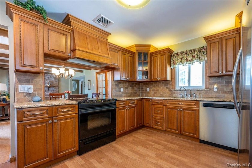 Expanded wide- line ranch set on a generous 75/150 property in - photo 10