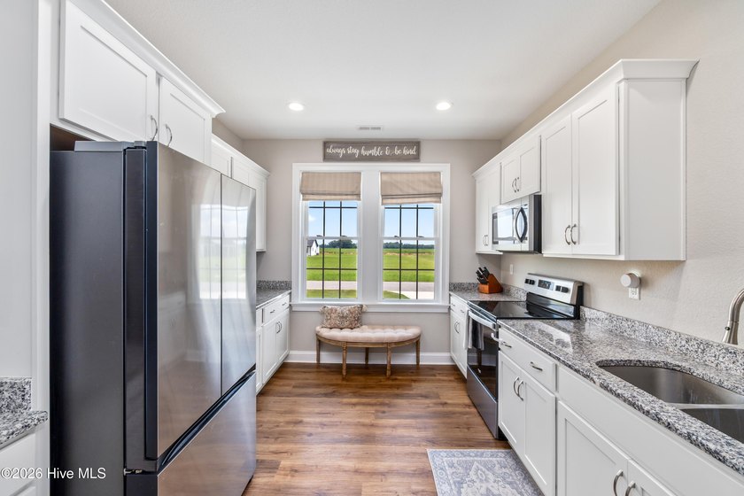 Welcome to 106 Spud Drive, a beautifully crafted home built in - photo 4