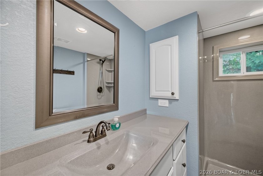 Beautifully updated lakefront home with a private dock, workshop - photo 37