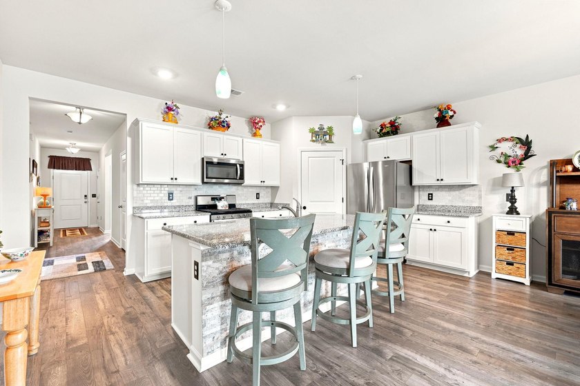 This Cali plan home at 143 Marauder Dr sits on a larger lot - photo 19