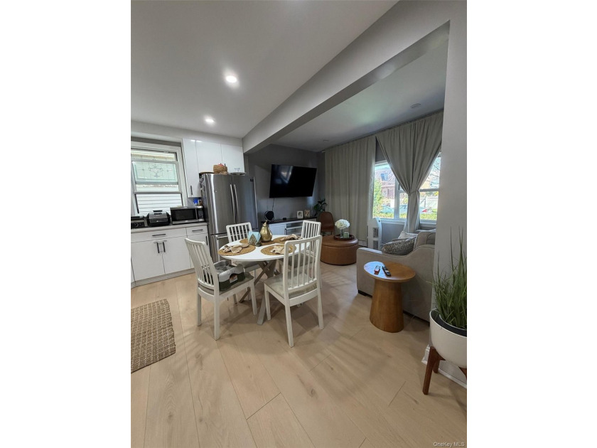 This is FULLY RENOVATED, with 2 gas meter and 3 electric meter - photo 4