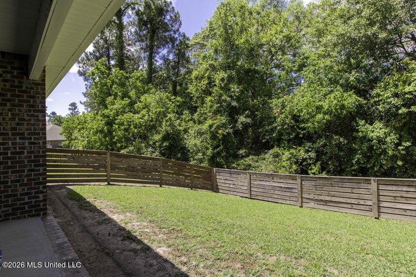Better than new! This beautiful home sits in the coveted - photo 26