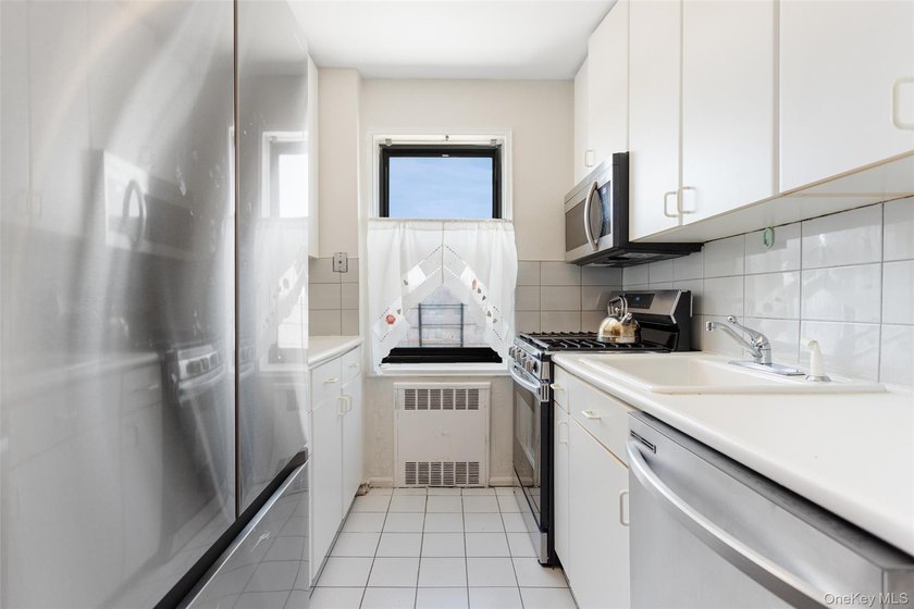Sophisticated and sun-filled two-bedroom co-op offering hardwood - photo 17