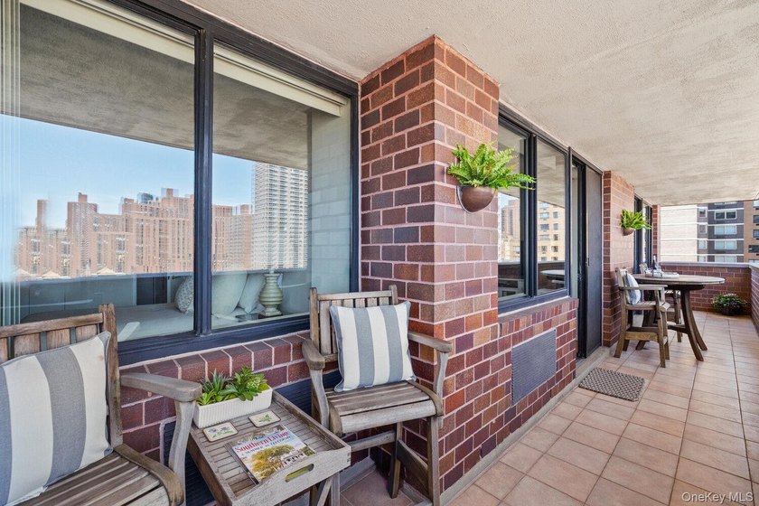 Perched on the 20th floor of a full-service Upper East Side - photo 15
