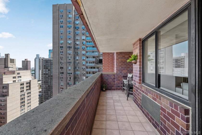 Perched on the 20th floor of a full-service Upper East Side - photo 17