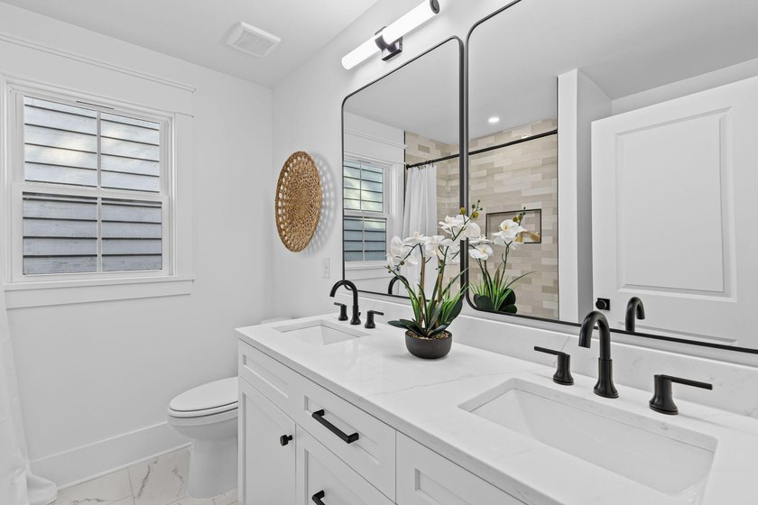 Welcome to 7 Larnes Street, a stunning elevated home located in - photo 22