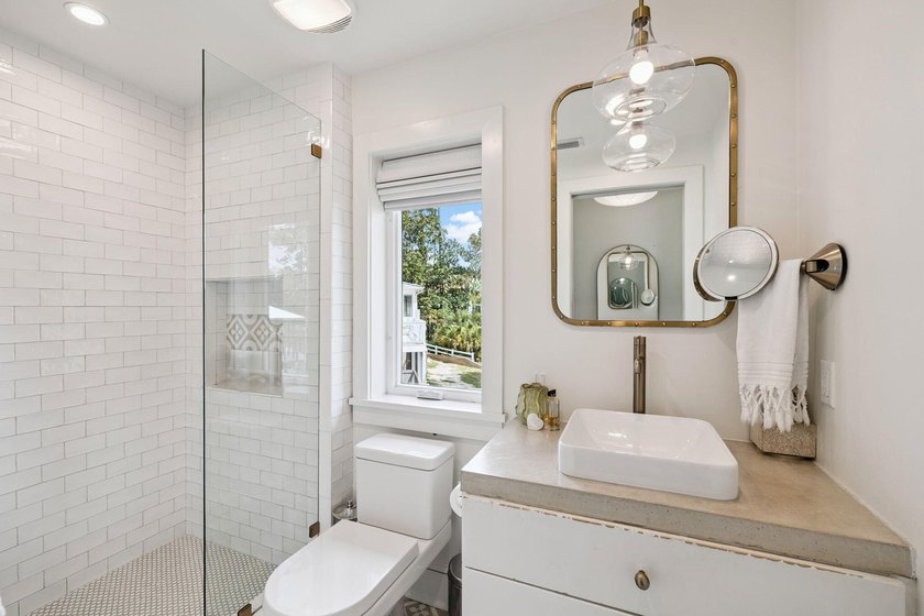 Welcome to this stunning waterfront retreat in historic Point - photo 44