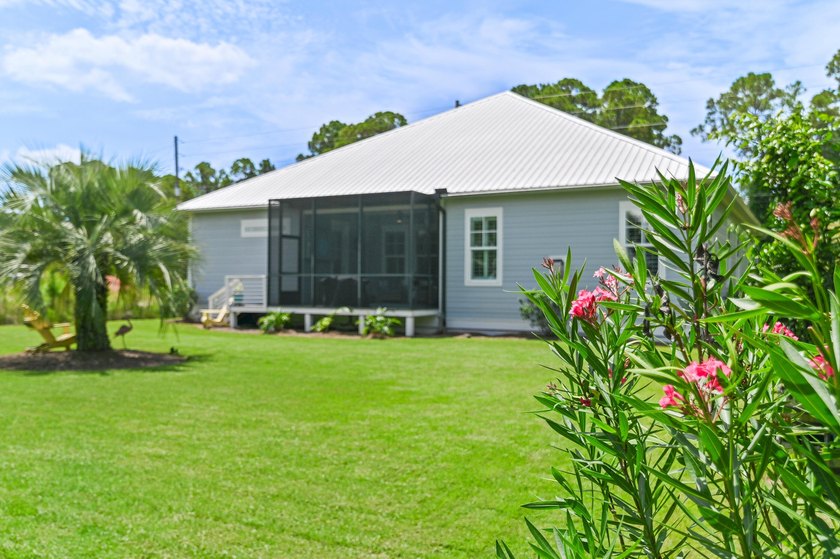 Escape to effortless coastal living in this bright and airy - photo 15