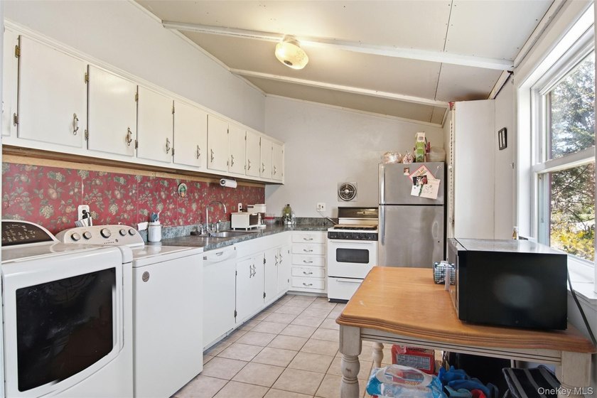Nestled in Three Village School District, this four bedroom - photo 7
