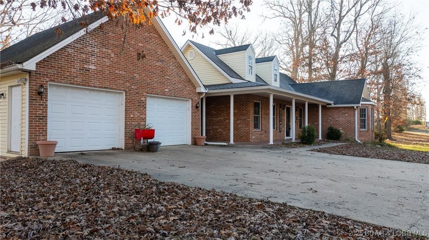 Country Brick home on 6 acres with a mix of open and wooded land - photo 3