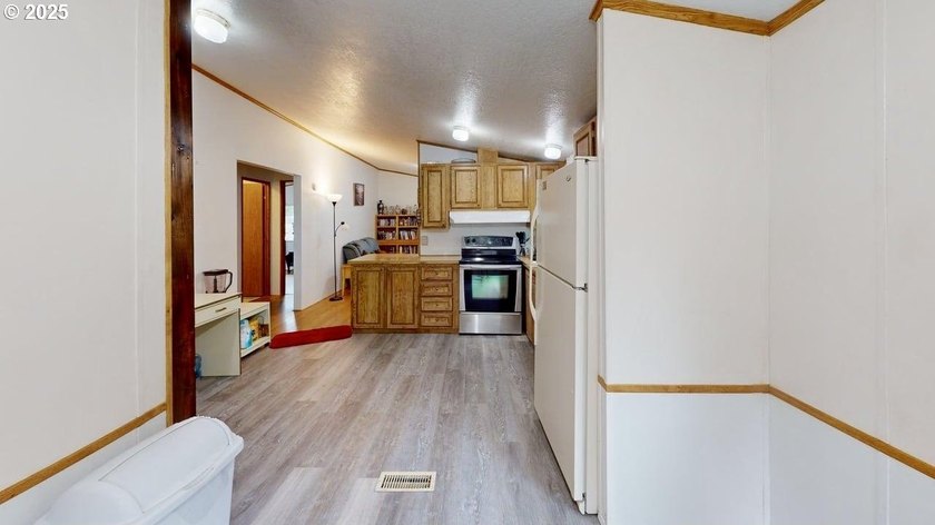 Move-in ready 1991 Skyline home in Port Orford! Features include - photo 4