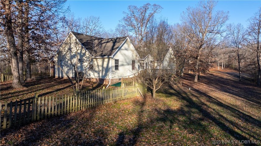 Country Brick home on 6 acres with a mix of open and wooded land - photo 8