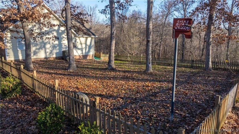 Country Brick home on 6 acres with a mix of open and wooded land - photo 9
