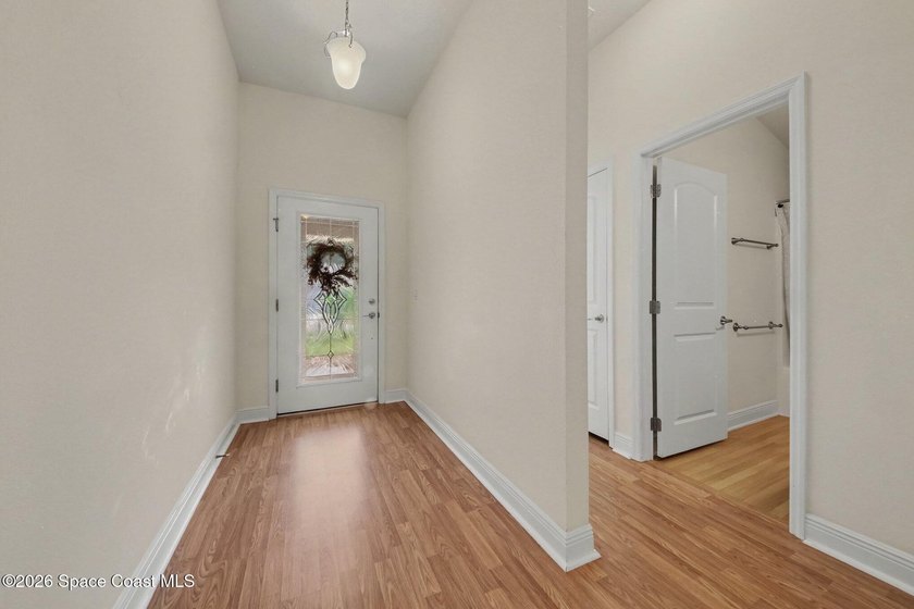 Welcome to this beautifully updated waterfront pool home located - photo 4