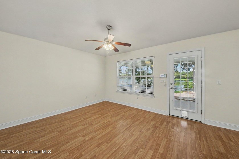 Welcome to this beautifully updated waterfront pool home located - photo 9