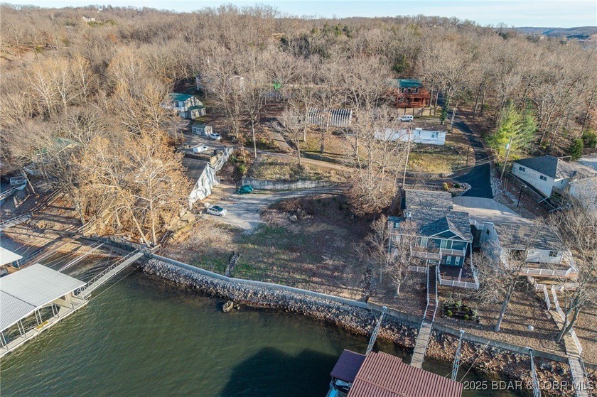 Rare Double Lakefront Lot in Highly Desirable Linn Creek Cove! - photo 7