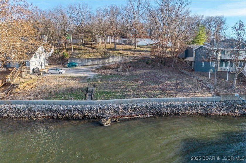 Rare Double Lakefront Lot in Highly Desirable Linn Creek Cove! - photo 9
