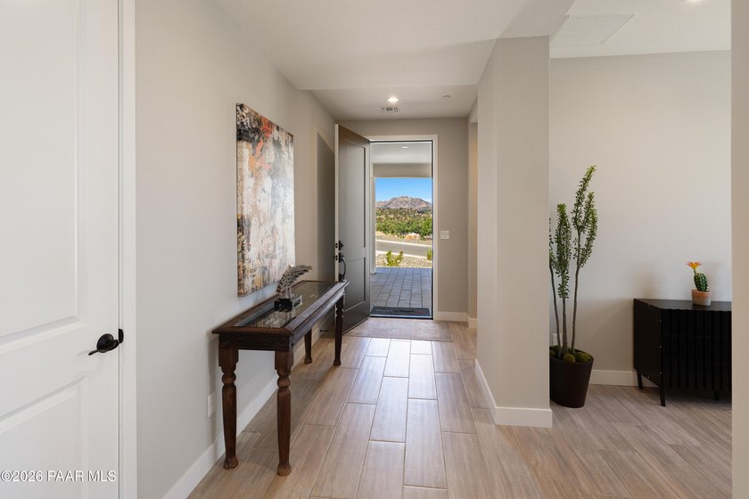 Perched on an elevated corner homesite in the highly desirable - photo 3