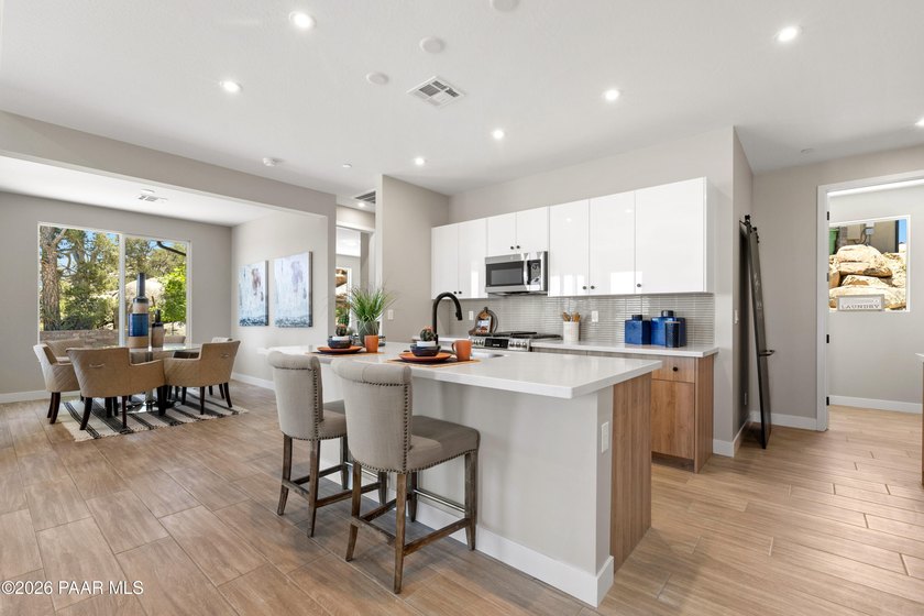 Perched on an elevated corner homesite in the highly desirable - photo 10