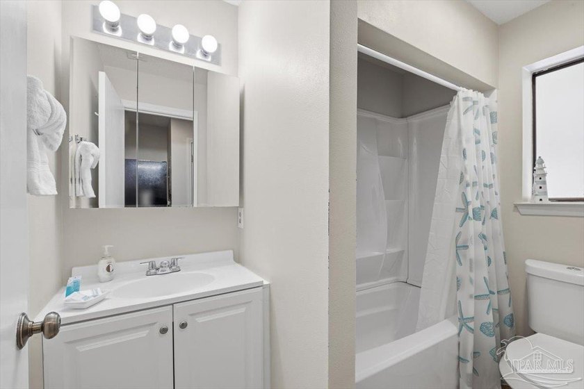 Top-floor condominium at The Palms at Sunset Harbor, just steps - photo 4