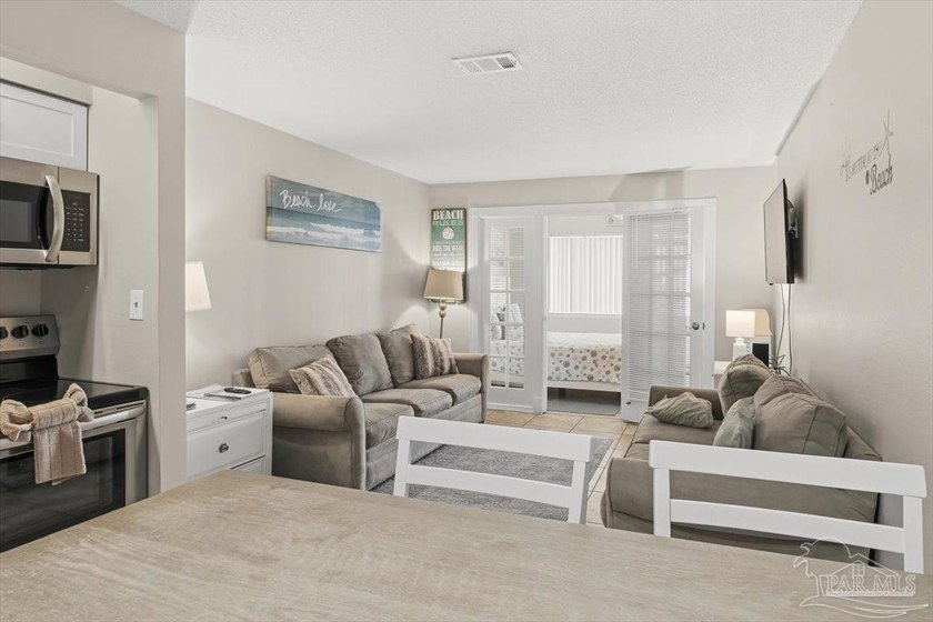 Top-floor condominium at The Palms at Sunset Harbor, just steps - photo 7