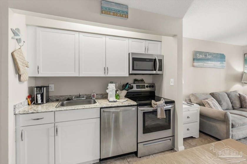 Top-floor condominium at The Palms at Sunset Harbor, just steps - photo 8